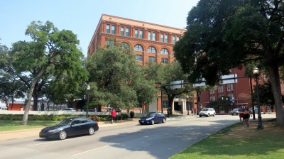 The old Book Repository building sits above the road where President Kennedy was shot.