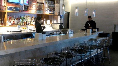 The fully stocked bar features premium liquors.