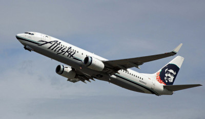 Alaska Airlines status match upgrade policy.